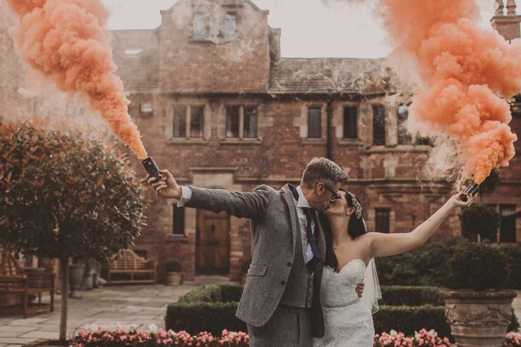 bride and groom portraits with smoke bombs