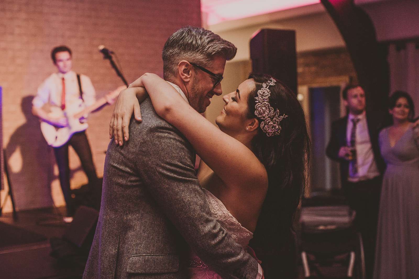 bride and groom dance together at their Colshaw Hall wedding reception