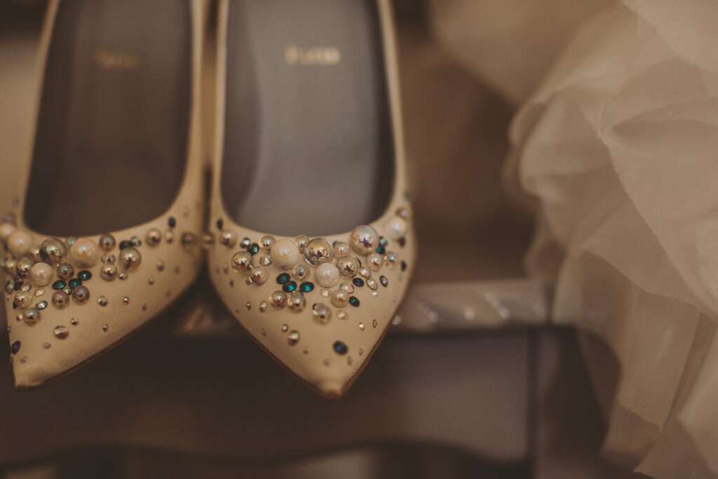 a close-up of sparkly wedding shoes photographed at Colshaw Hall
