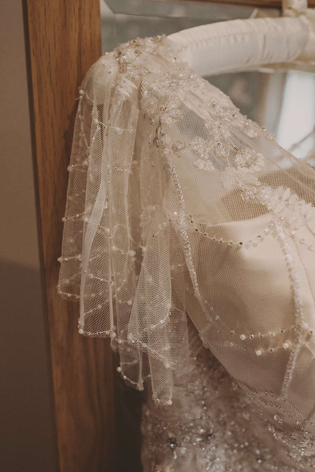 closeup photo of lace detail on wedding dress