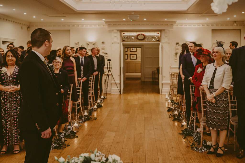 guests wait for arrival of bride