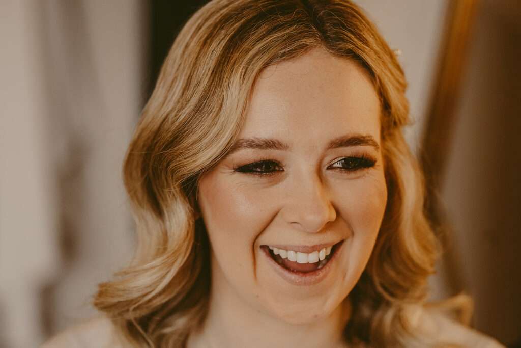 closeup of bride during bridal preparations at Ashfield House wedding venue