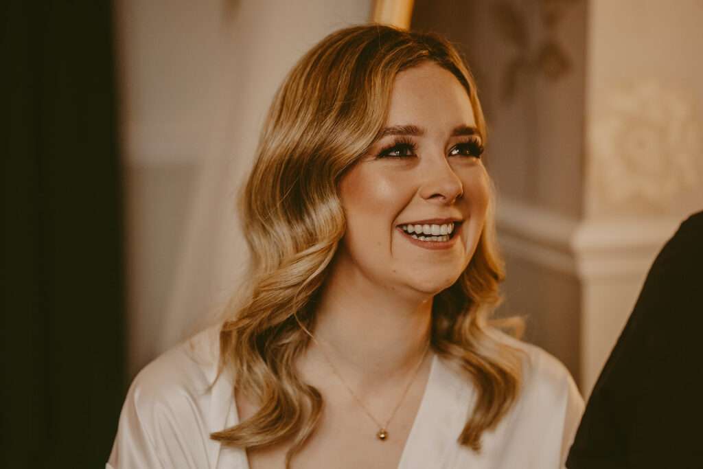 bride smiling during bridal preparations
