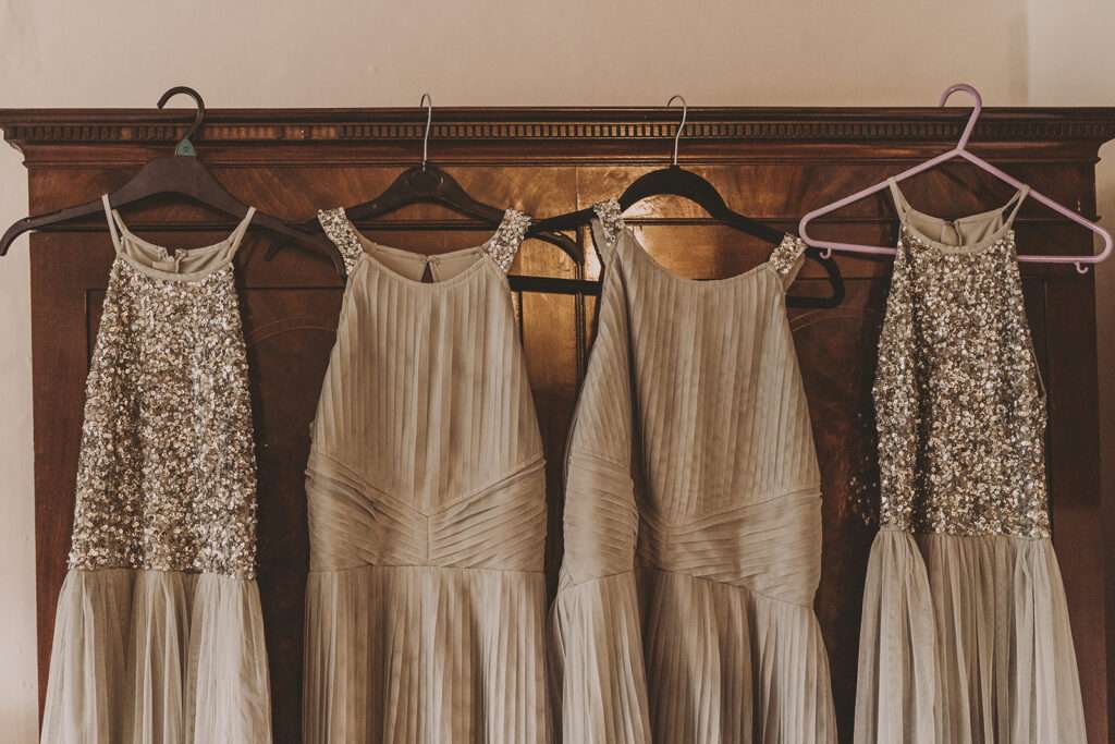 bridesmaids dresses hanging up in the bridal suite at Eyam Hall